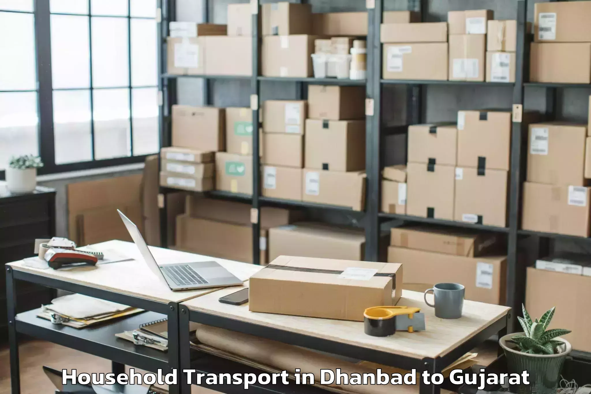 Top Dhanbad to Bedi Household Transport Available